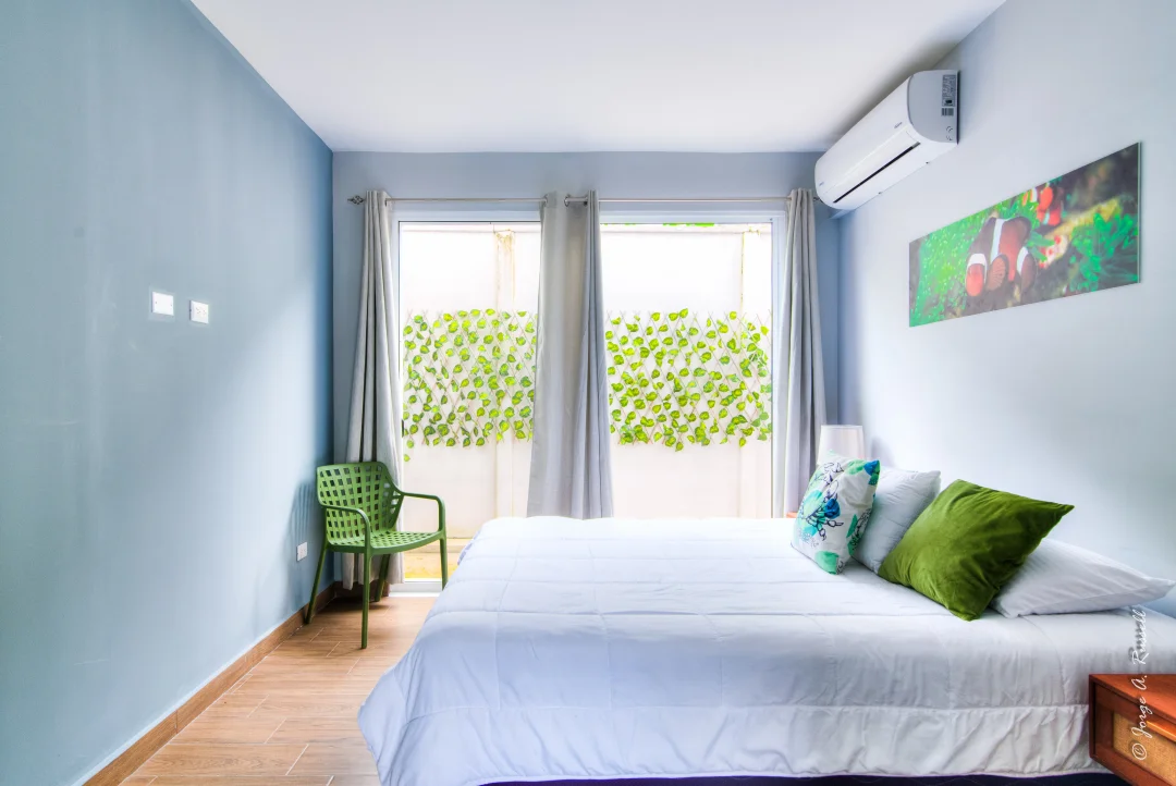 Corals Arena · bedroom with patio doors